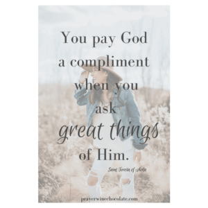 Woman in field wearing a hat, the quote written over the image states "You pay God a compliment when you ask great things of Him" Saint Teresa of Avila